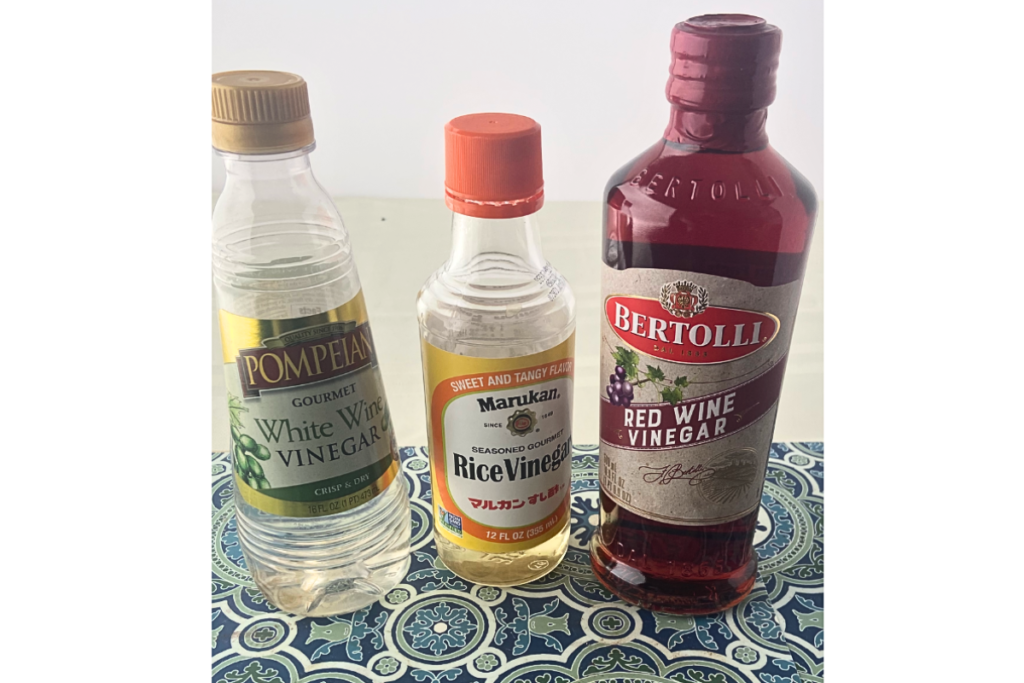 Bottles of Red Wine Vinegar, White Wine Vinegar and Rice Wine Vinegar.