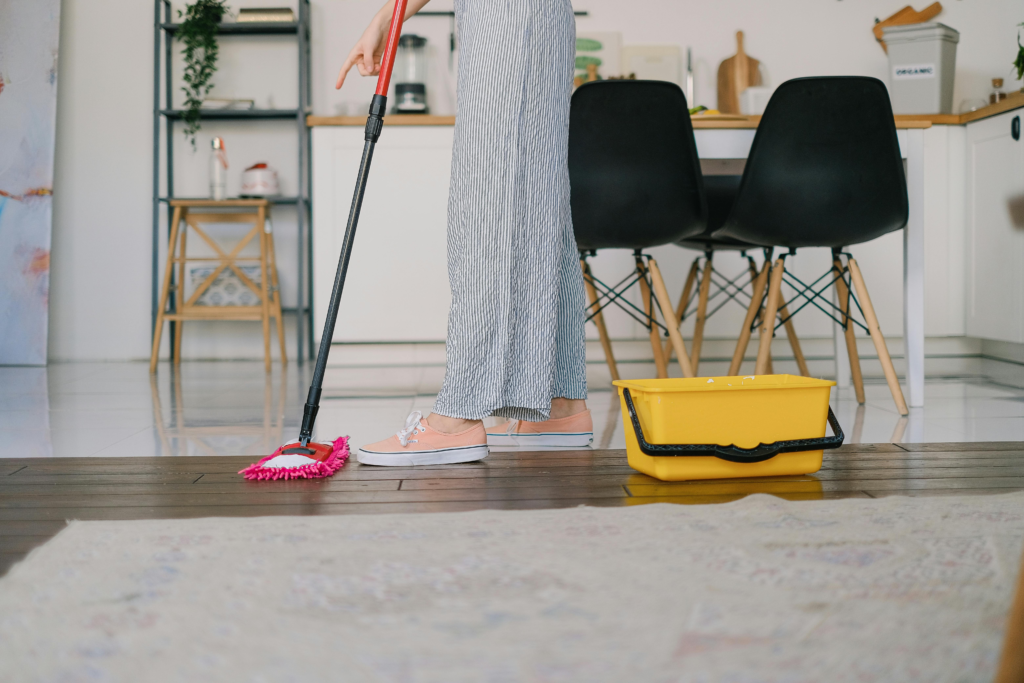 microfiber mop with bucket of vinegar solution